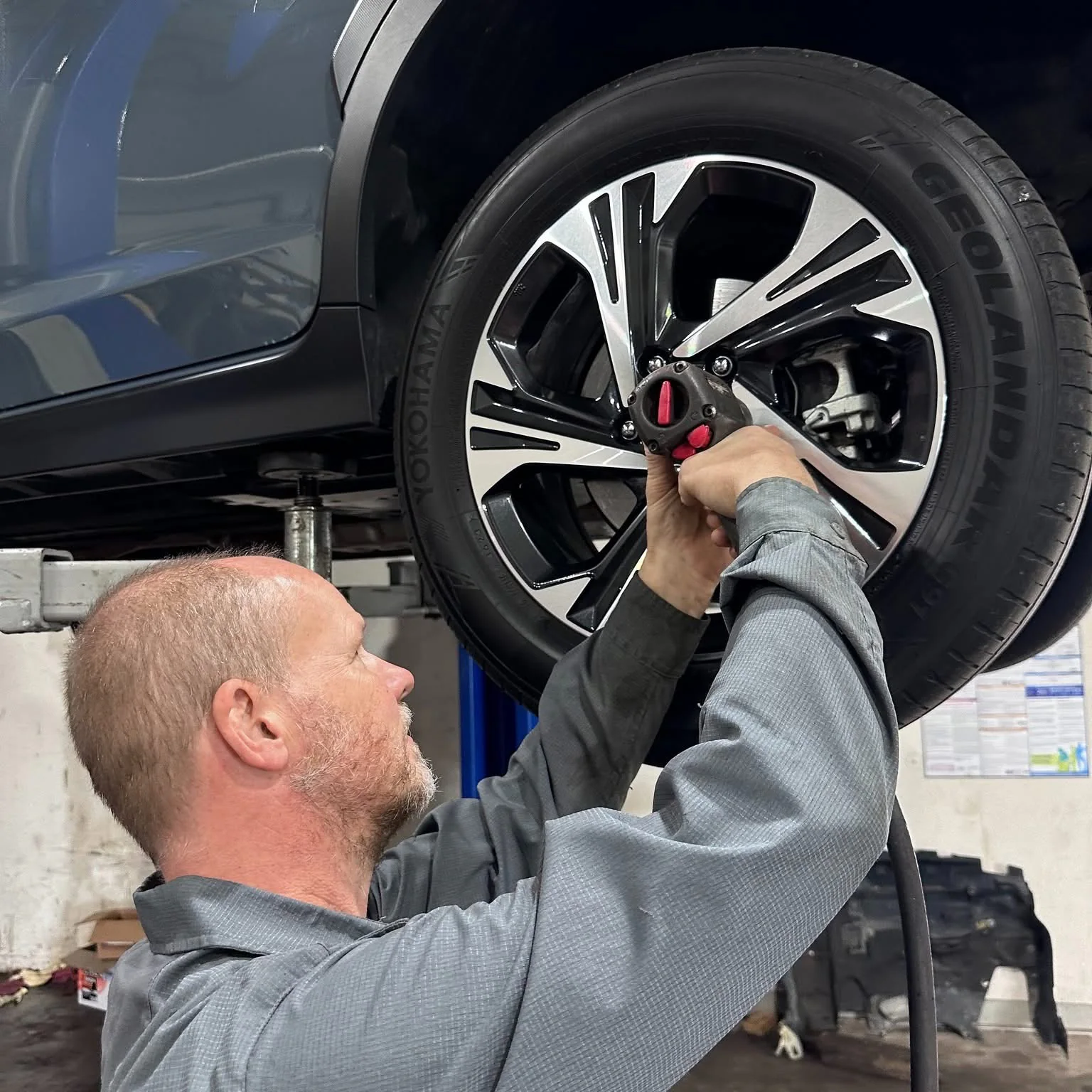 Dennis working on a vehicle in the Waterford European shop